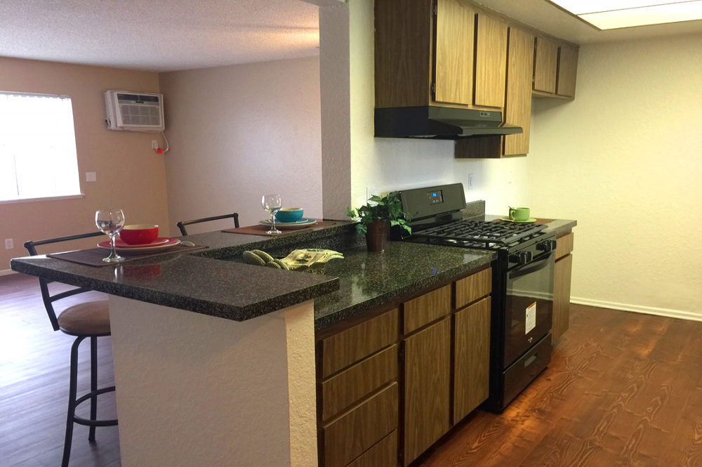 Take a tour today and view 2 bed 2 bath resurfaced counters 11 for yourself at the Cinnamon Creek Apartments